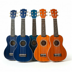 Obraz premium four colorful ukuleles arranged in a row on a white background