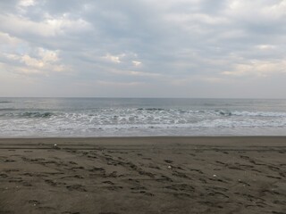Sandy beach, sea and sky