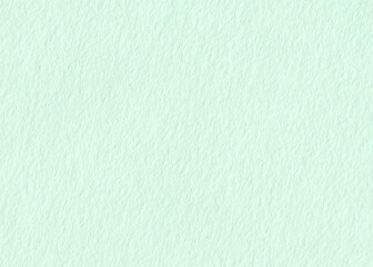 Green pastel color paper texture background. Natural grainy surface texture for design.