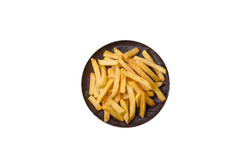 Delicious crispy French fries with salt and spices