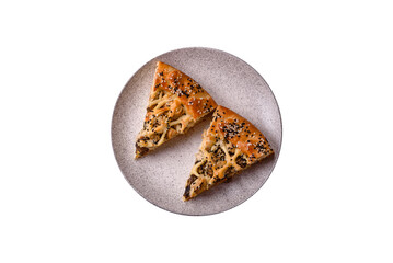 French quiche with chicken or salmon, cheese, salt, spices and herbs