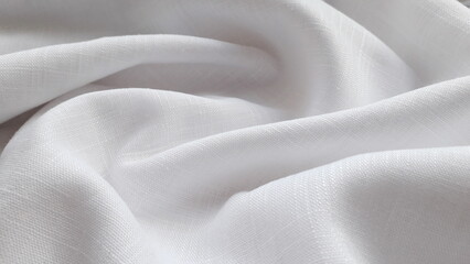 White linen fabric for summer clothes. Flax. Cotton. Texture of linen fabric. Textile linen...