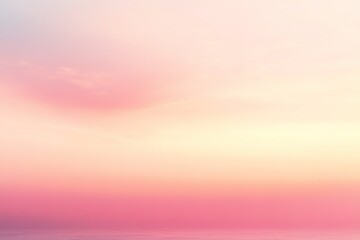 Naklejka premium Pastel sunset over calm ocean water.