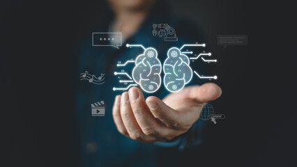 hand presents a glowing AI concept hologram featuring a brain icon connect to digital symbol representing automation, communication, music, video, and internet technology, symbol advanced innovation.