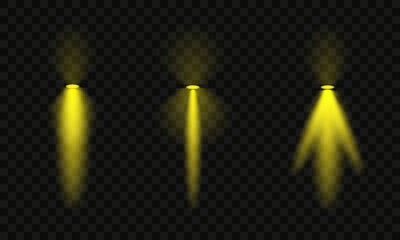 A set of yellow spotlight effects on a dark background. Collection of vector flares. Yellow glare. Vector illustration EPS10