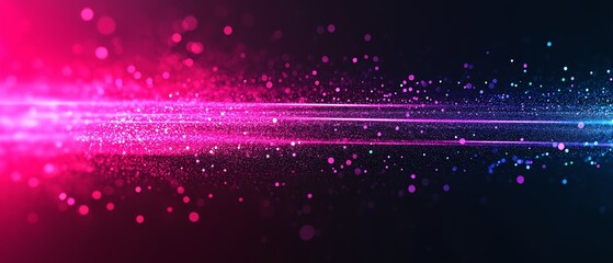 Obraz premium A vibrant and dynamic light trail featuring a blend of pink and blue particles against a dark backdrop, ideal for use in backgrounds, motion graphics, and digital art projects.
