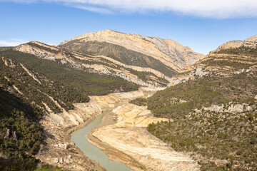 Lack water Canelles Reservoir. The swamp is at very low water levels due to lack of rain. Desertification, climate change, environmental problems, drought. Lleida, Spain
