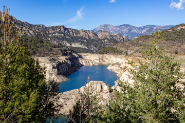 Lack water La Llosa Del Cavall Reservoir. The swamp is at very low water levels due to lack of rain. Desertification, climate change, environmental problems, drought. Lleida, Spain