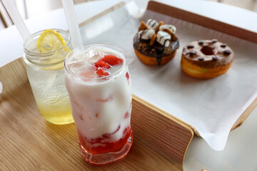 Strawberry latte and lemon tea ice and donut
