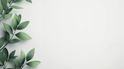 Fototapeta premium Fresh green leaves on a plain background, nature-inspired style, copy space