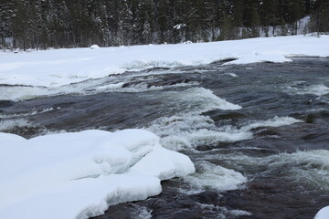 Magic winter waterfall Storforsen in the  North of Sweden