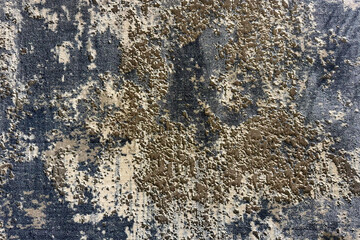Abstract pattern or abstract texture of carpet flooring in shades of blue, dark blue, and gold...