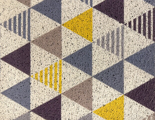 Carpet rug texture in geometrical triangle pattern. In white, blue, yellow, black, and grey color....