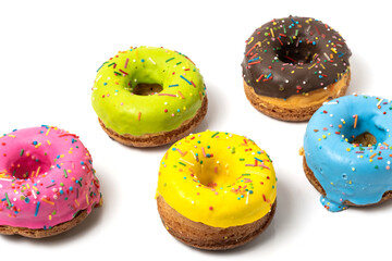 Colorful donuts isolated on a white background.