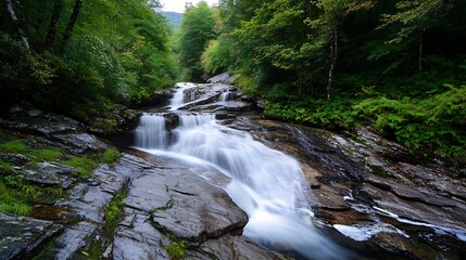 Obraz premium Forest Waterfall Cascading Over Stone Rocks Surrounded by Greenery : Generative AI