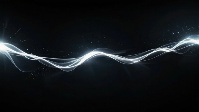 Close-up of abstract red light trail against black background