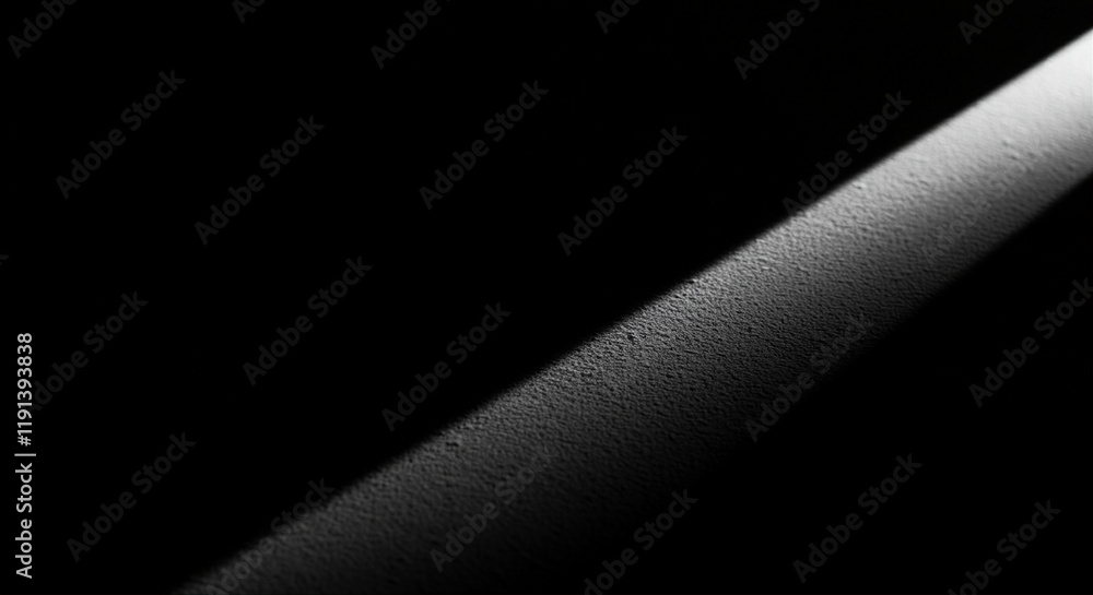 Aufkleber shadow and light interaction on textured surface creating dramatic contrast