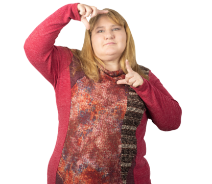 Creative Woman Framing with Her Fingers in a Focused Pose