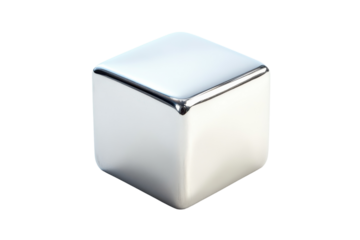 Polished metal cube resting on a white surface, showcasing its reflective surface and geometric design