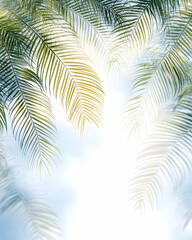 Tropical palm leaves frame a bright sky, ideal for summer vacation brochures or travel websites