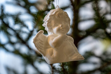 White Angel Ornament on Christmas Tree