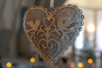 Decorative Heart Ornament with Bird Design. Intricate Metal Heart Decoration with Doves.