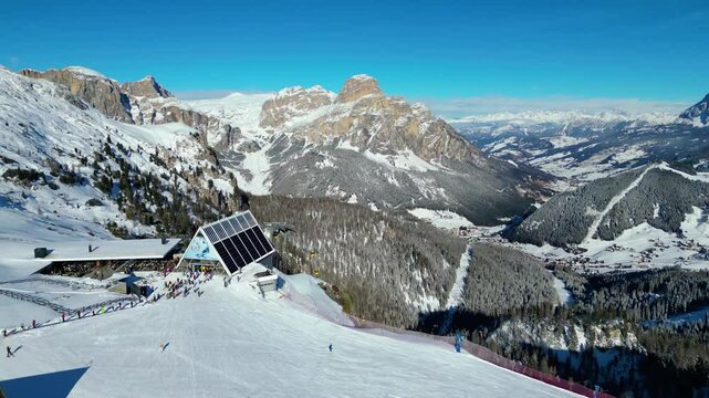 Gruppo del Sella and the famous Sellaronda ski circuit shine in this breathtaking winter aerial view, captured by drone. The Piz Bo&egrave; station on the Alta Badia ski resort reveals its alpine charm