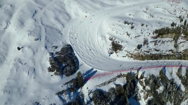 Gruppo del Sella and the famous Sellaronda ski circuit shine in this breathtaking winter aerial view, captured by drone. The Piz Bo&egrave; station on the Alta Badia ski resort reveals its alpine charm