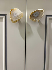 Natural agate coasters attached to cabinet doors