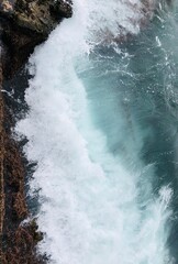 Powerful Ocean Waves Crashing Against Rocky Shoreline &ndash; Aerial View