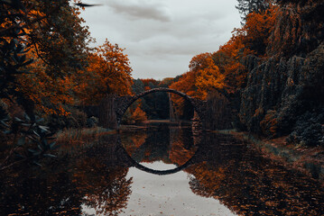 Spectacular autumn landscape with a view on Devli's Bridge in Germany