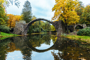Spectacular autumn landscape with a view on Devli's Bridge in Germany