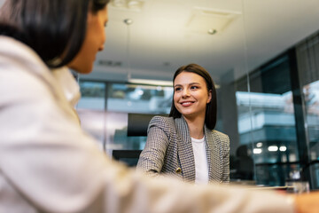 Two businesswoman working together in the office.