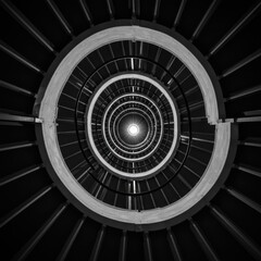 circular monochrome pattern, concentric rings, hypnotic spiral, geometric design, black and white, intricate details, optical illusion, symmetrical composition, abstract art, radial structure, futuris