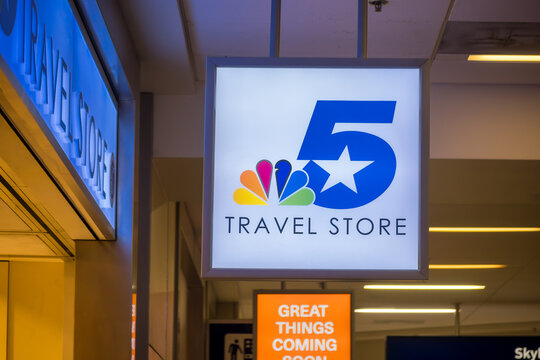 NBC 5 travel store sign board at Dallas Fort Worth International Airport in Texas.