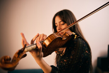 Pretty Young Woman Playing a Violin