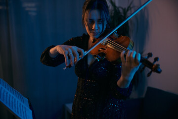 Female Violinist is Preparing for a Concert