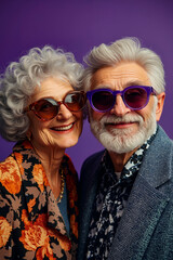Obraz premium A man and a woman wearing sunglasses pose for a picture