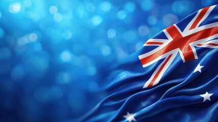 Australian flag waves proudly in the breeze captured in vibrant blue background