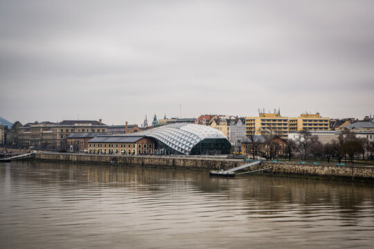 Budapest, Hungary - January 22, 2023: B&aacute;lna Honv&eacute;delmi K&ouml;zpont (CET), a modern department store and mall, on the Duna (Danube) waterfront.