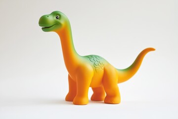 Naklejka premium Adorable Orange and Green Dinosaur Toy