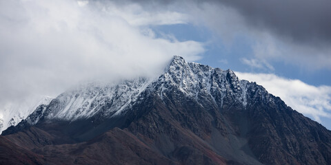 Scenic panoramic landscape in autumn time in Alaska countryside.