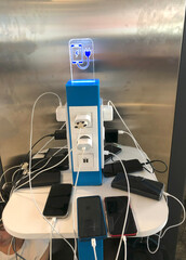 Free charging plug outlet in the airport terminal service for traveler
