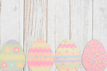 Easter egg background on weathered wood