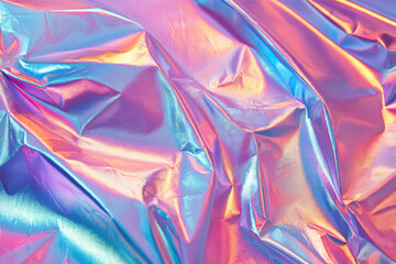 Vibrant Iridescent Holographic Foil Paper Texture with Pink and Blue Highlights
