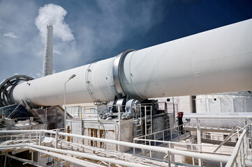 Naklejka premium Tubular rotary furnace for lime processing and chimney