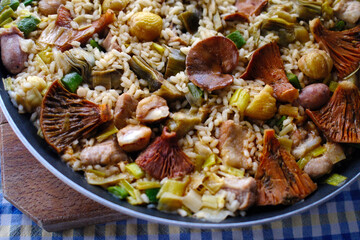 typical spanish rice with seafood or meat and mushrooms