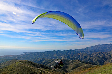 Paraglider flying from Itrabo, Spain	