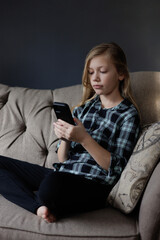GeneratedPortrait of girl Playing Game on phone. Relaxing in Living Room image