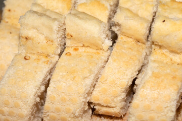 Close Up of Fresh Baked Golden Bread Crusty Tiger Baguette Sliced Cut  Roll
